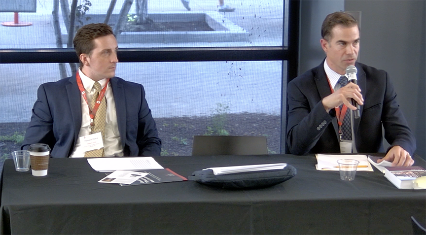 Speakers, two men in suits