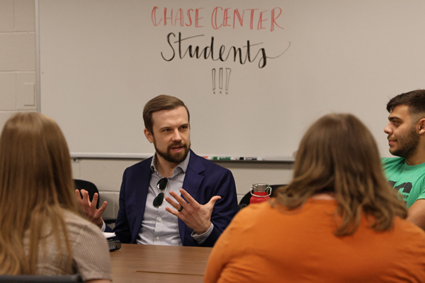 Students and faculty engage in debate during a class