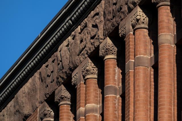 Columns on a brownstone building on Ohio State campus.